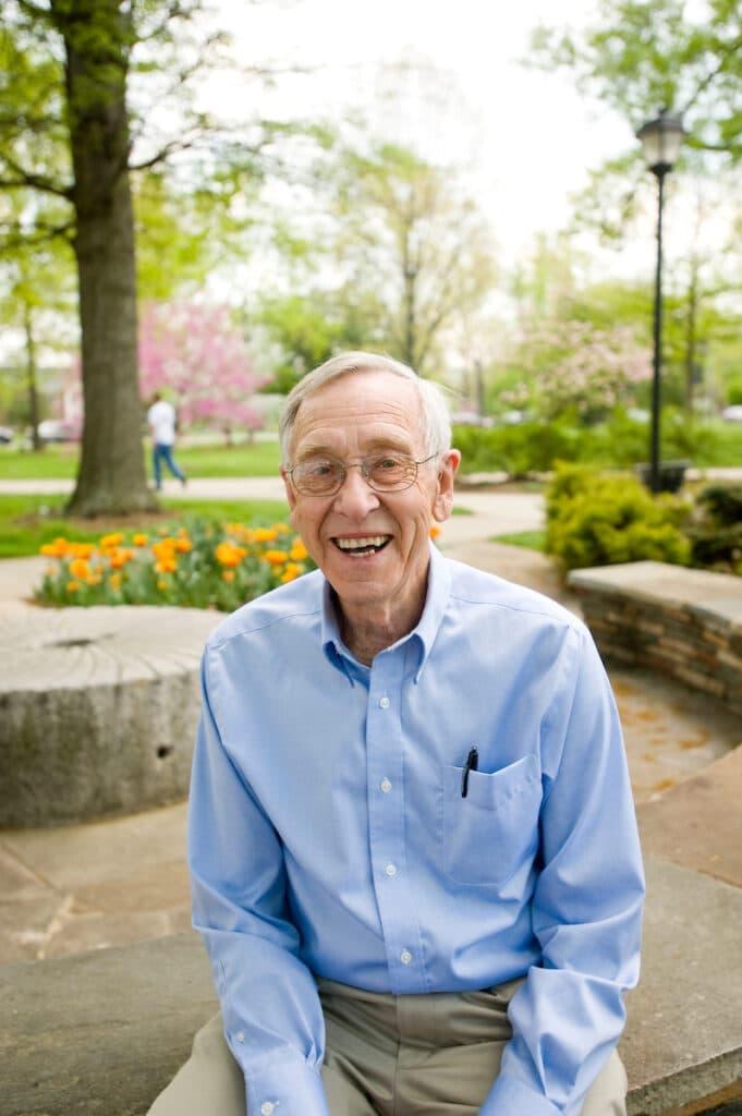 Portrait of Loyal Jones by the Fee Glade on campus in 2010.
